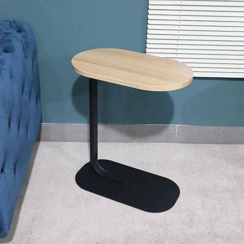 Minimlistisk C-formad sidobord