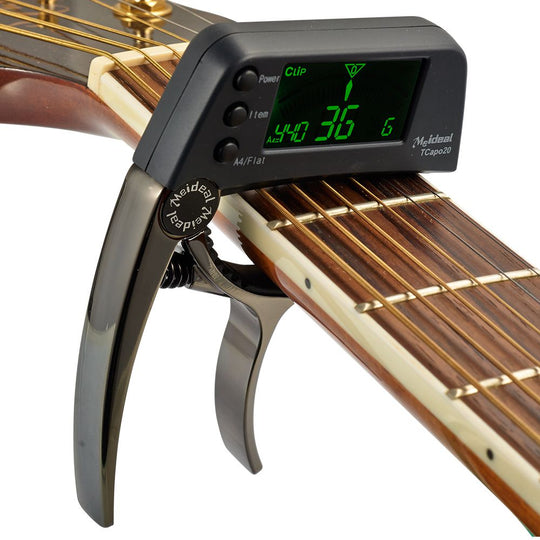 2-i-1 kapod och stämmare för gitarr